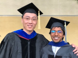 Chang and Arjun at commencement, 2018